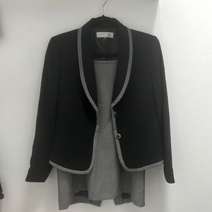 Never worn matching gray + black skirt suit
